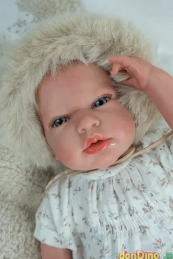 Bebé Reborn Isabella 40 cm. con Cojín Beige