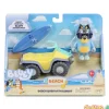 Vehiculo con figura bluey